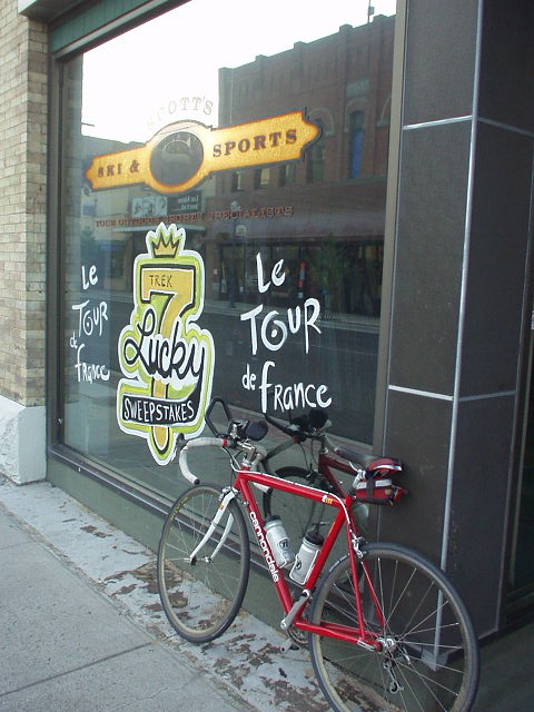 My Cannondale in front of a bike shop and this "Le Tour de France" sign after a 30-mile bike ride.