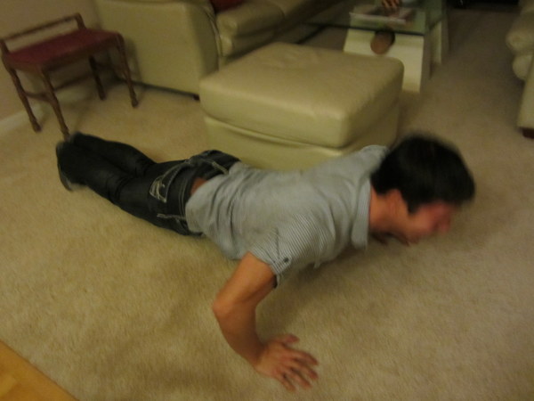 Doing one of my final sets of pushups.