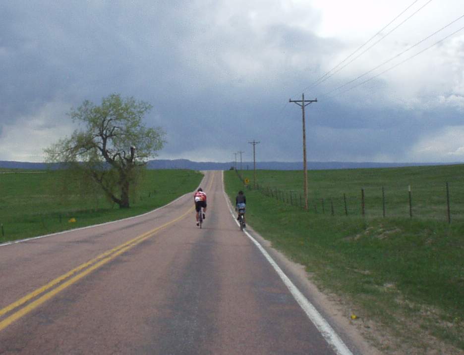 [Mile 128, 3:18 p.m.] Briefly following a couple of other randonneurs through along countrysides.