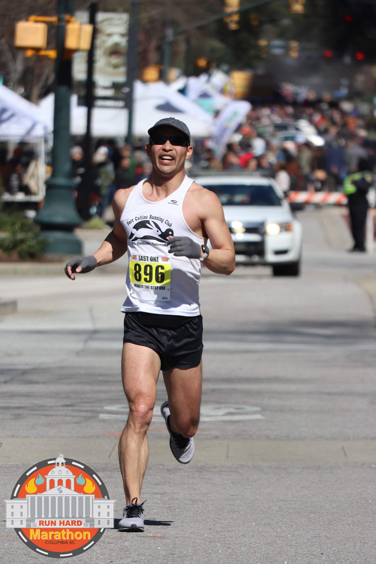 Felix Wong sprinting into the finish of the 2020 Run Hard Columbia Marathon.