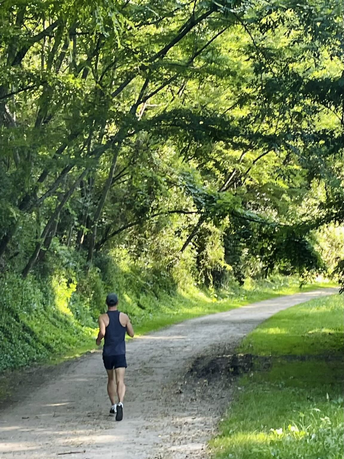 Felix running through A Illa das Esculturas park in Pontevedra.