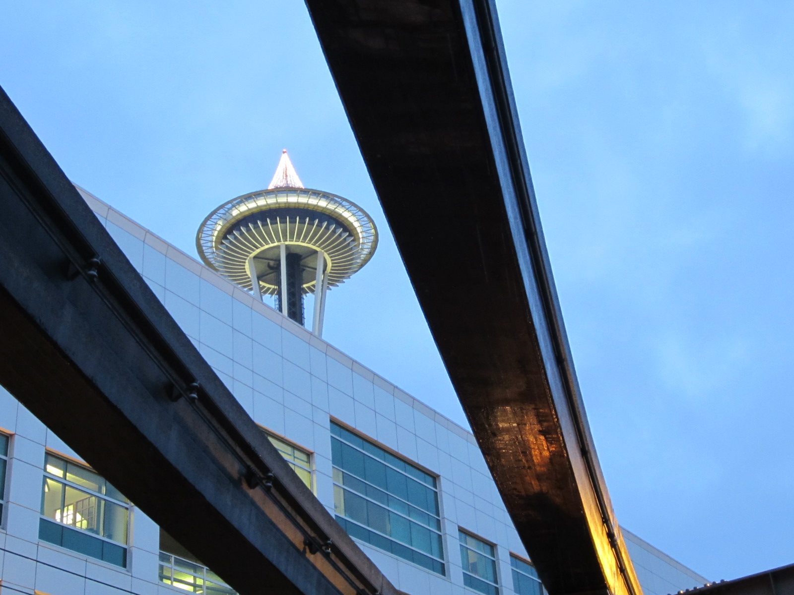 The Space Needle seen through the rails of the monorail.