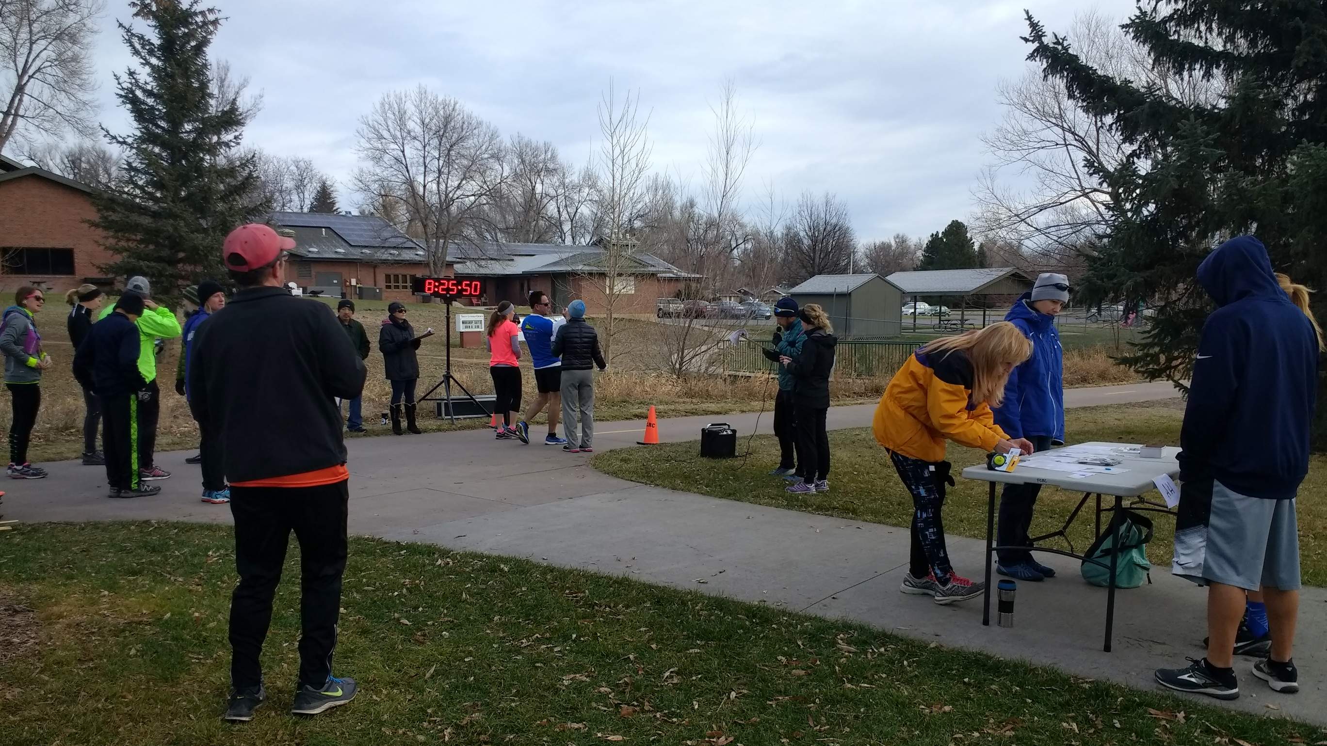 Runners and volunteers at the start of the Fort Collins Running Club's 2017 Spring Park 6k Tortoise & Hare race.