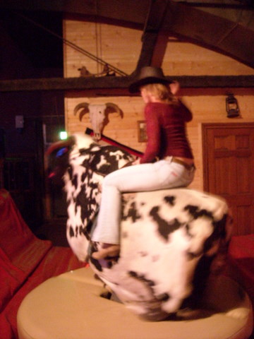 Tanya riding the mechanical bull.  She hung on for nearly a minute.