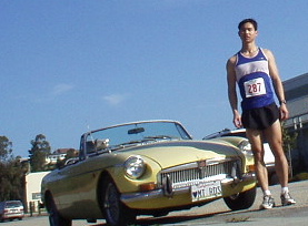 Felix Wong and Goldie, who got the pleasure of driving up Highway 17 from Fremont to Santa Cruz today.  No sweat for the MG...