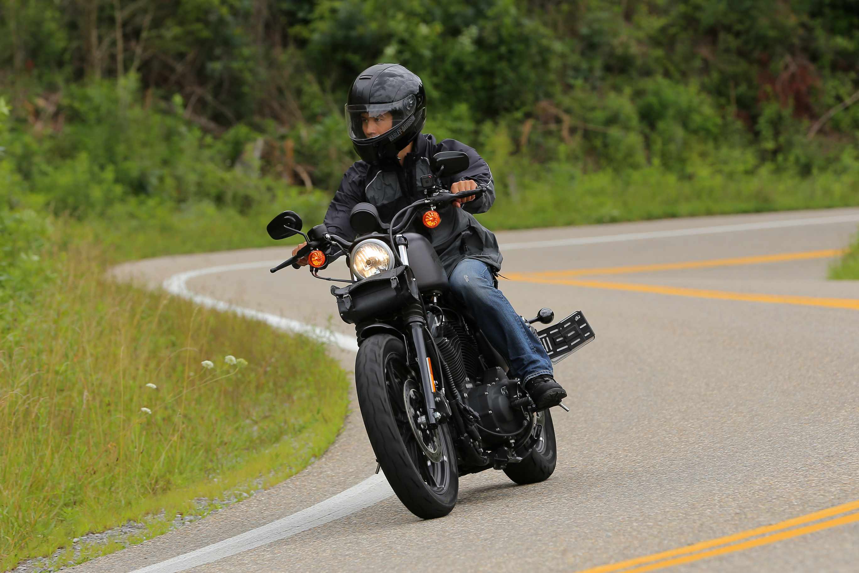 Felix Wong riding a Charcoal Denim Harley-Davidson Sportster Iron 883 on the Tail of the Dragon (Rt. 129).