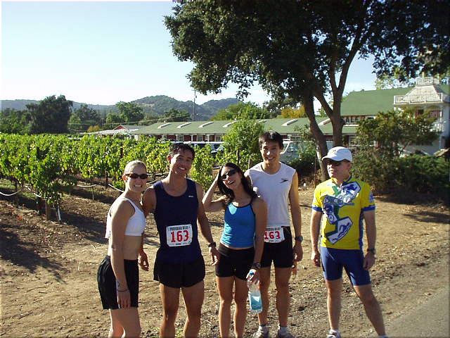 [Mile 26, 3:28 elapsed, 3:58 p.m.] After the fifth leg, we ran into fellow Tri-City Tri Club member Peter, who was a race volunteer.  He snapped this picture of Heidi, Felix, Lisa, Everitt and Phil while we awaited Mike's arrival.