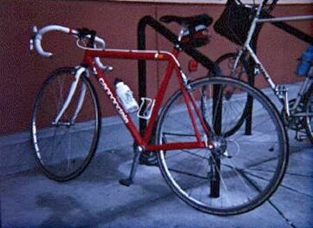 In addition to shuttling me from class-to-class, she was my training bike, race bike, and commuter.  Here she is in Spring 1996 on a run to Walmart in Mountain View, California.