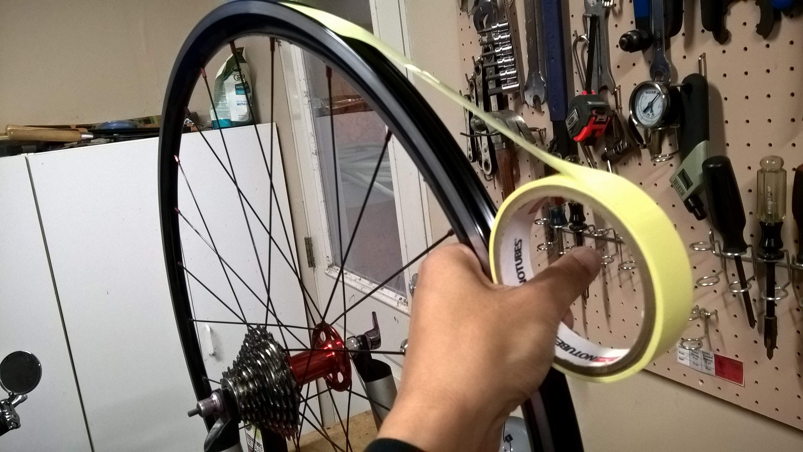 Successfully converting a pair of Yishun 27mm Alloy Clincher Road Wheels to tubeless using Stan's Rim Tape by Stan's NoTubes.
