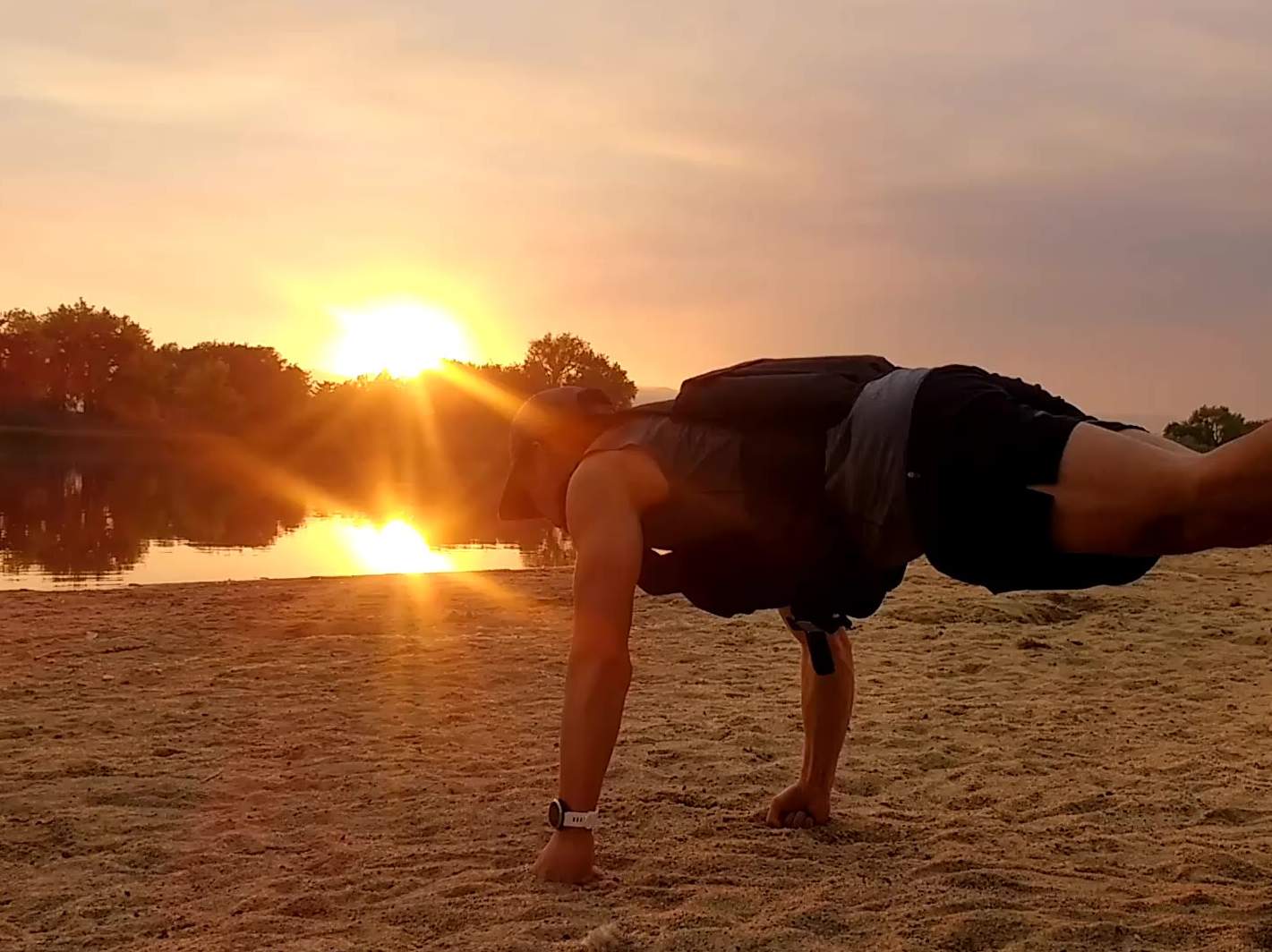 sunset at Richards Lake beach, Felix Wong doing push-ups