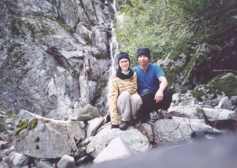 [Ohlone Wilderness Trail, Jan 2002] Sarah and Felix Wong in front of the falls.