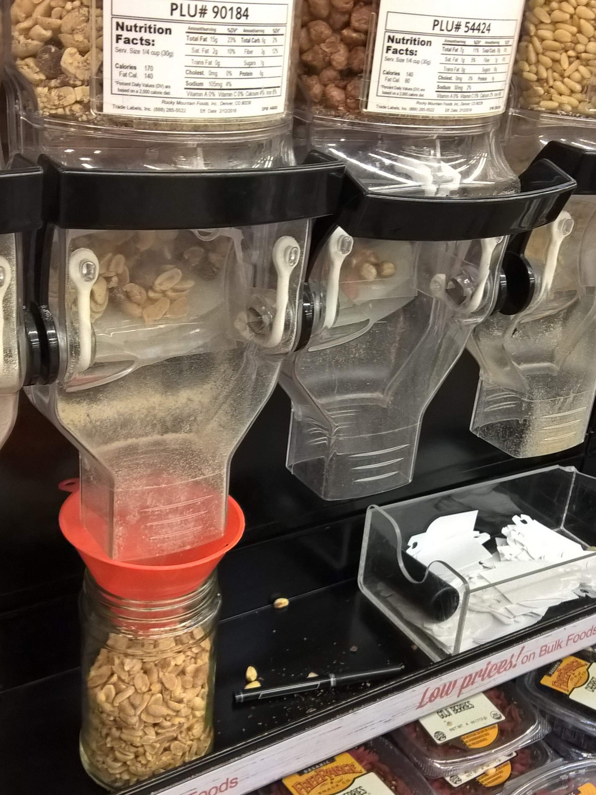 You can fill your own jars in the bulk sections of King Soopers. In this photo, I used an orange funnel I brought, but the funnel is unnecessary and I no longer bring one.