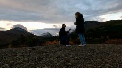 Felix proposing to Andrea on the top of Flattop Mountain in Anchorage, Alaska.