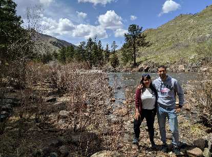 Vicky and Antxon in front of the Poudre River after we drove the route for the Colorado Marathon.
