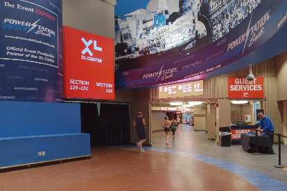 Runners running a 5k inside the XL Center in Hartford Connecticut before the 2020 Arena Attack Indoor Marathon. Runners running a 5k inside the XL Center in Hartford Connecticut before the 2020 Arena Attack Indoor Marathon.