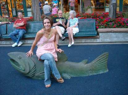 Leah likes to pet the fishies. Leah likes to pet the fishies.