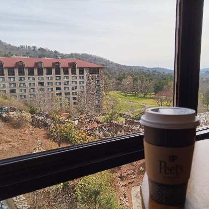 Enjoying a Peet's Coffee and the view behind the Grove Park Inn in Asheville.