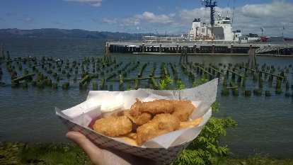 Enjoying the fish and chips in front of the Columbia River in Astoria, Oregon. fish and chips, ship, Columbia River, Astoria, Oregon