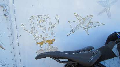 SpongeBob SquarePants drawing on white panel, Specialized Romin Evo Pro saddle