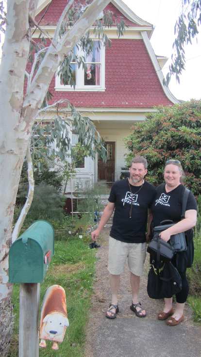 Corey Harn and Heather Douglas sporting black Arrrstoria T-shirts in Astoria, Oregon. Corey Harn, Heather Douglas, black Arrrstoria T-shirts