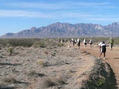 Photo: Mile 7: A runner stretches with a nice view of the mountains ahead.