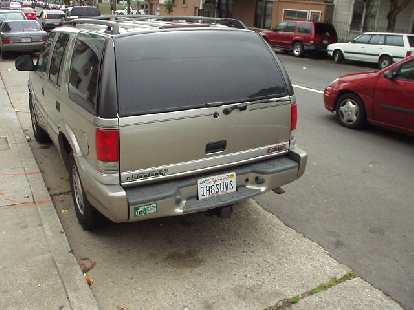 In the streets of SF was this rather ironic license plate on this SUV.  Click on the photo to see what it says.