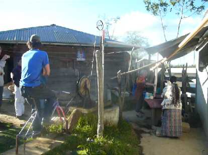 Bruce pedaling a bicibomba (bicycle water pump) in a rural area west of San Andres Itzapa.