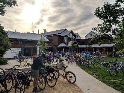 There were lots of people and bikes at the New Belgium Brewery station.