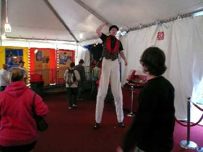 A tall guy at the circus.