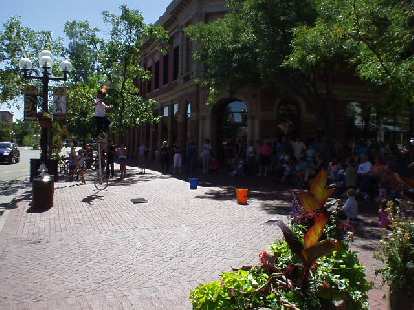Dudes like this one on a unicycle juggling flames always attract a big crowd and adds to the character of Pearl Street Mall. Dudes like this one on a unicycle juggling flames always attract a big crowd and adds to the character of Pearl Street Mall.