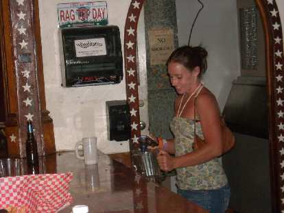 Chelsea helping herself out behind the bar at Washington's.