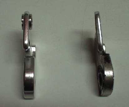 More detail on the Griffen's replaceable rear derailleur hanger.  The one on the left is a new one; the one on the right is the bent one.