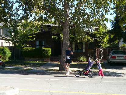 Baby pushing his stroller. Baby pushing his stroller.