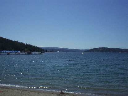 [Coeur d'Alene, Idaho] At last, almost 1100 miles from the San Francisco Bay Area, I make it to my destination.  This is the crystal-clear Lake Coeur d'Alene, viewed from the beach at the Coeur d'Alene resort.