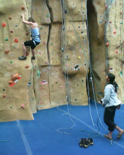 Leah climbing a 5.10 with Alyssa belaying.