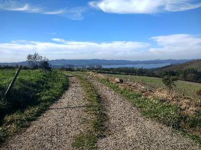 A few miles east of Oveira on the Camino de Fisterra, I could see the waters of Encoro de Fervenza. A few miles east of Oveira on the Camino de Fisterra, I could see the waters of Encoro de Fervenza.