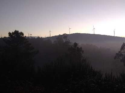 Windmills in the early morning as seen from the Camino de Fisterra. (13 Oct 2017) Windmills in the early morning as seen from the Camino de Fisterra.