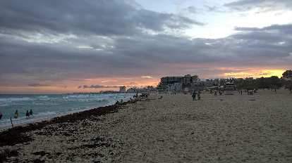 Cancun beach, sunset, sand, ocean waves