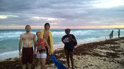 Alberto François, Jana Nicholson, Renzo Ibañez, Pauline Asher standing on beach in Cancún