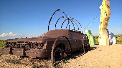 Brown 70s station wagon at Carhenge. Photo: Brown 70s station wagon at Carhenge.