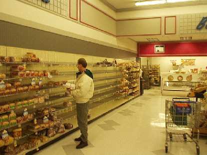 Being inside Albertson's was surreal, since during the blizzard it was not able to be restocked. The bread shelves were near-empty, and there were rows of empty fruit stands (not shown).