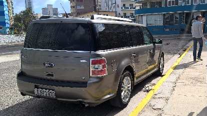 A grey Ford Flex in front of the U.S. Embassy in Havana, Cuba. (08 Jan 2017) A grey Ford Flex in front of the U.S. Embassy in Havana, Cuba.