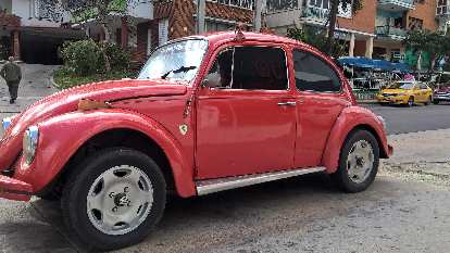 A red Volkswagen Bug with a Ferrari decal in Havana, Cuba. (09 Jan 2017) A red Volkswagen Bug with a Ferrari decal in Havana, Cuba.