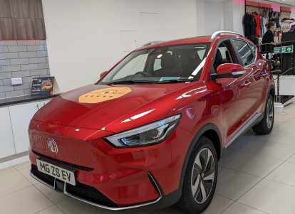 A red MG ZS EV electric crossover.