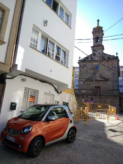 An orange 2016 Smart Fortwo coupe in Fisterra, Spain. (13 Oct 2017) An orange 2016 Smart Fortwo coupe in Fisterra, Spain.