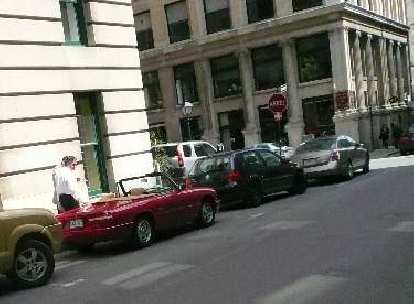 Also in Old Montreal, I saw my Alfa Romeo there, but in red. I would have taken a better photo except then the two guys shown in the photo went up to admire it.