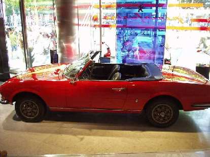 In Peugeot's Champs Elysees showroom was dedicated to its Pininfarina-styled cars.  This particularly Peugeot looked just like a lengthened Fiat Spider, which is not too surprising considering Pininfarina penned that too!