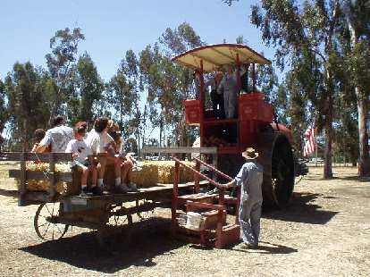 Here's a massive steam-powered farm tractor that used firewood as fuel.  We went for a ride.