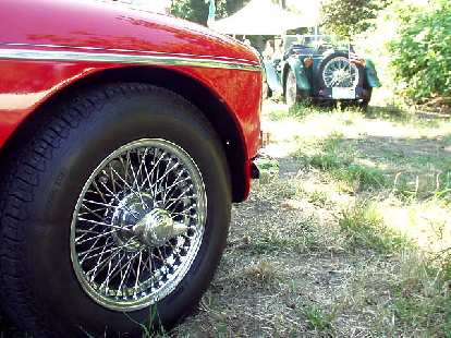 View of a sealed (tubeless) wire wheel with Dan Shockey's 1935 MG PA in the background.