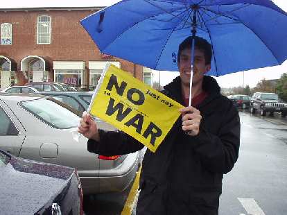 The Research Triangle is very liberal, although admittedly I might have gotten that impression by hanging around with Dan a lot. Here he is with a "No War" flag. The Research Triangle is very liberal, although admittedly I might have gotten that impression by hanging around with Dan a lot. Here he is with a "No War" flag.